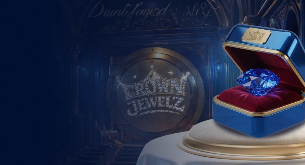Blue jewellery box with a sapphire on a red velvet cushion, branded Crown Jewelz