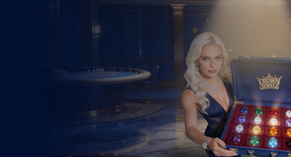 Blonde woman in a navy dress opening a case of coloured gems branded Crown Jewelz