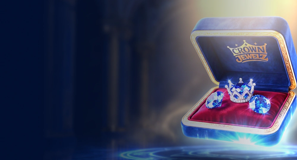 Blue velvet box with the Crown Jewelz logo, a crown and two sapphires on red velvet